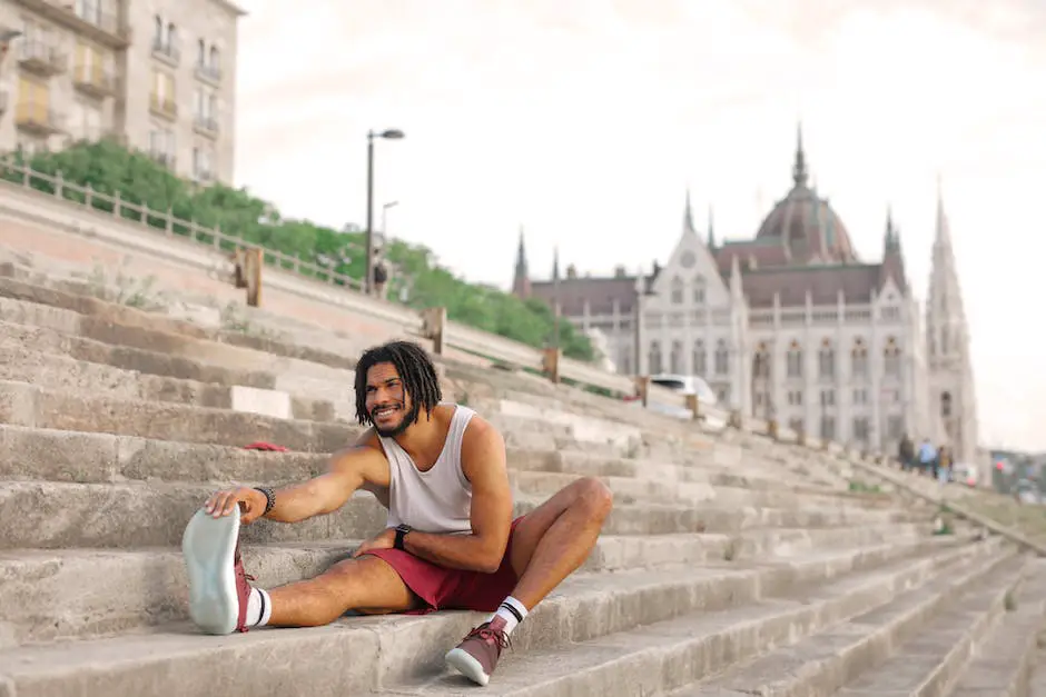 Image of a person stretching their leg muscles before going up a flight of stairs